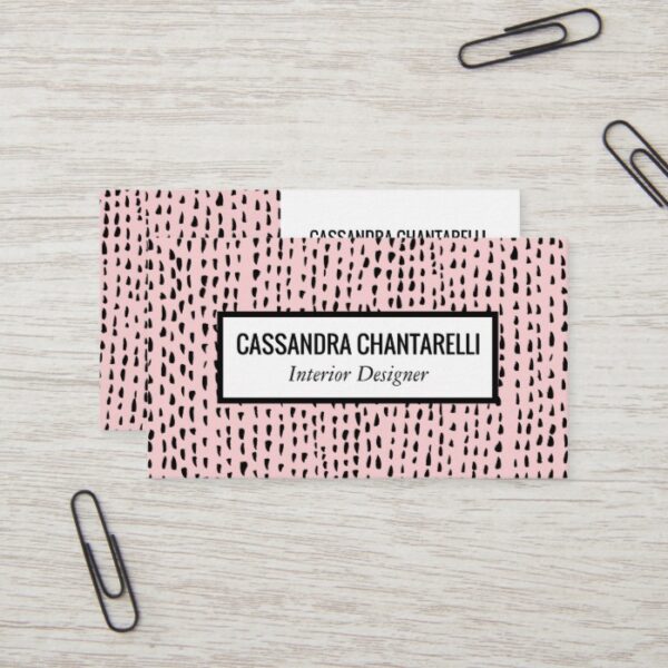Abstract ink dots on pink business card design